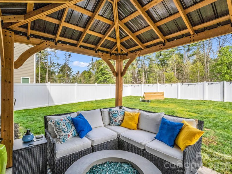 Relax outside with space for play for your four-legged family members.