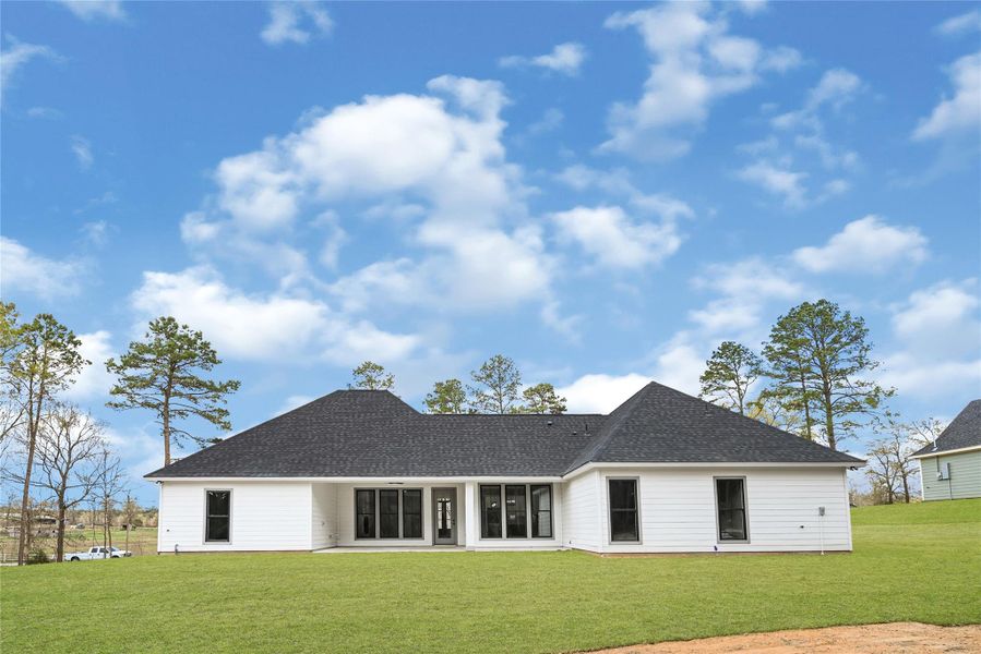 Exterior details and patio area of a home in , Plantersville (Image 4).