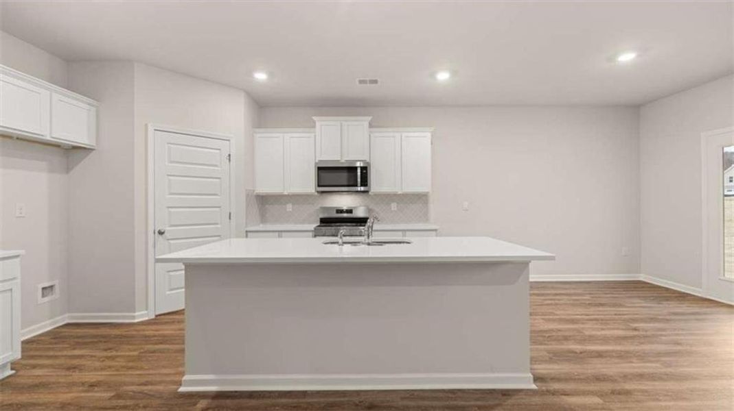 Furnished interior view inside a new home in Brooks Station, Dacula (Image 3).