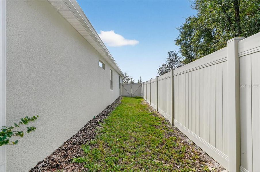 Exterior details and patio area of a home in Canopy Terrace, Deland (Image 28). Exterior details and patio area of a home in Canopy Terrace, Deland (Image 28).