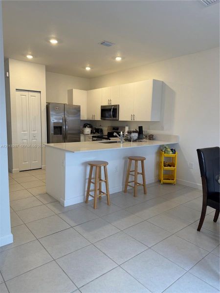 Furnished interior view inside a new home in , Miami (Image 9).