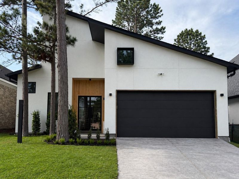 Front exterior of a new home in , Montgomery, TX, highlighting curb appeal (Image 29).