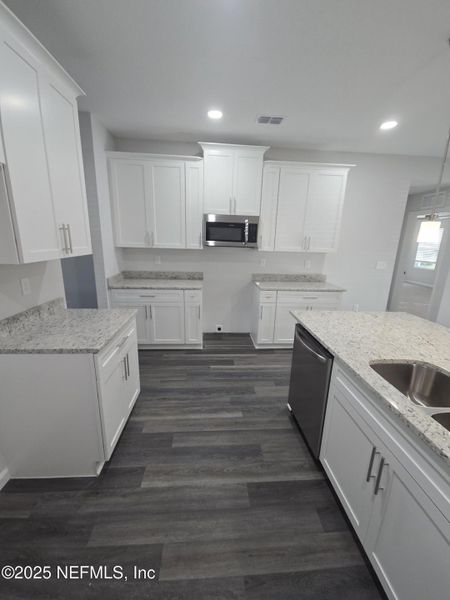 Furnished interior view inside a new home in , Jacksonville (Image 29).