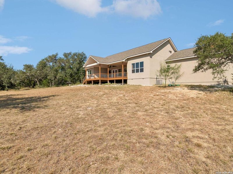 Exterior details and patio area of a home in , Spring Branch (Image 35).
