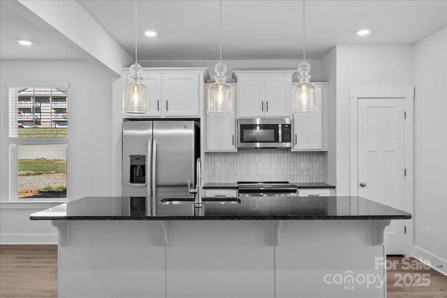 Furnished interior view inside a new home in Clayton Crossing, Arden (Image 6). Furnished interior view inside a new home in Clayton Crossing, Arden (Image 6).