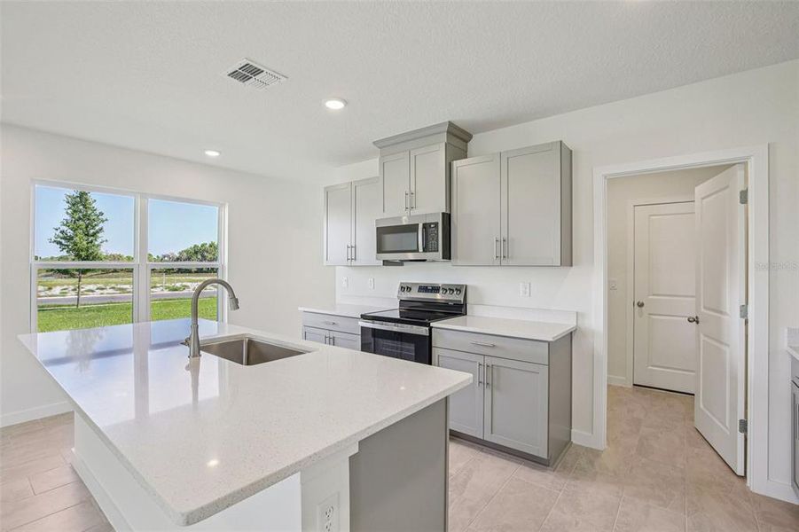 Furnished interior view inside a new home in Willowbrook North, Winter Haven (Image 7).