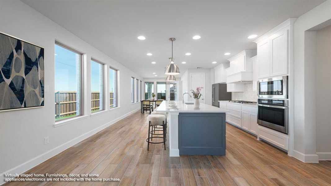 Furnished interior view inside a new home in The Parks At Wilson Creek 40', Celina (Image 9). Furnished interior view inside a new home in The Parks At Wilson Creek 40', Celina (Image 9).