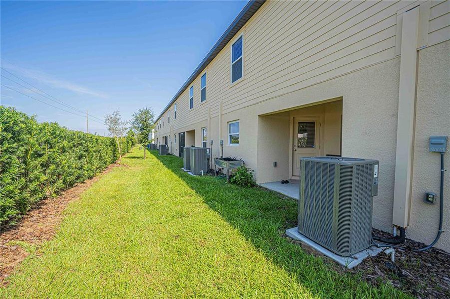 Front exterior of a new home in Hamlets of Tavares, Tavares, FL, highlighting curb appeal (Image 26). Front exterior of a new home in Hamlets of Tavares, Tavares, FL, highlighting curb appeal (Image 26).