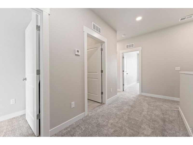 Spacious, unfurnished interior of a new home in The Lakes at Centerra, Loveland (Image 21).