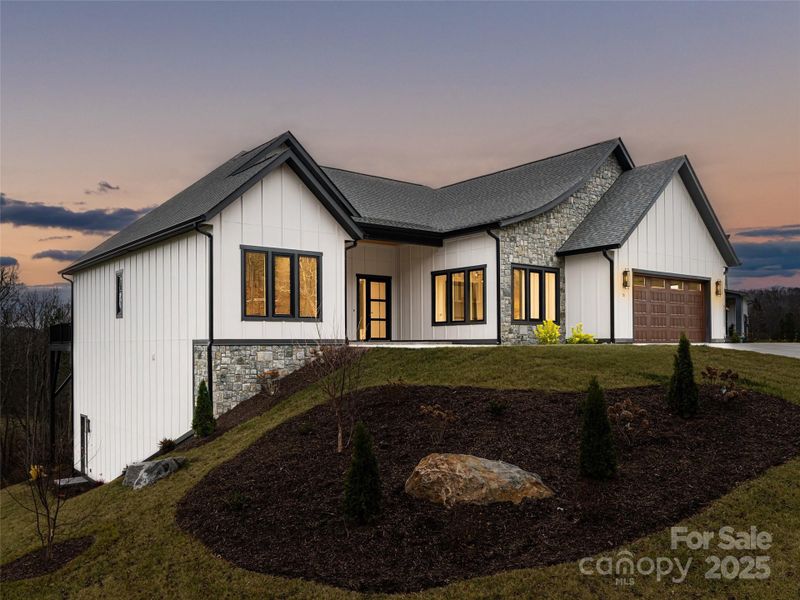 Front exterior of a new home in , Candler, NC, highlighting curb appeal (Image 29). Front exterior of a new home in , Candler, NC, highlighting curb appeal (Image 29).