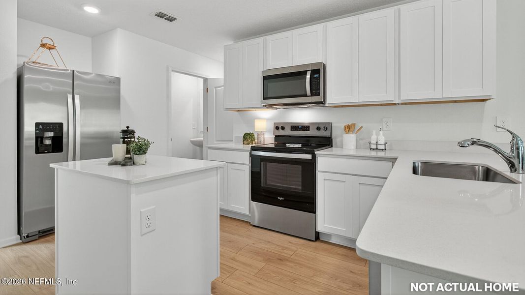 Furnished interior view inside a new home in Trout River, Jacksonville (Image 11).