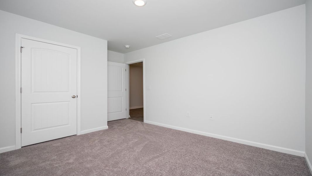 Representative unfurnished interior of a home built from the KERRY by D.R. Horton in Stanbury Creek, Supply (Image 15).