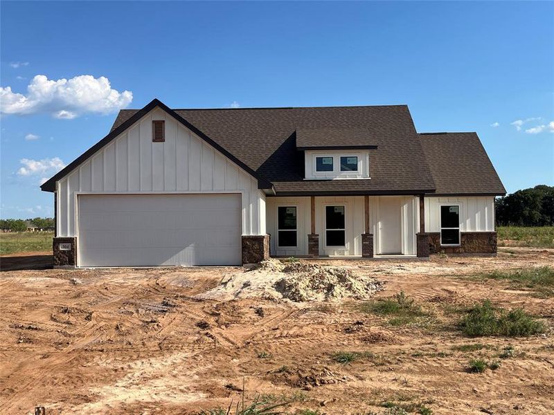 View of front facade with a garage