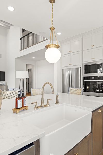 Representative furnished interior of a home built from the 6051 by Tradition Homes in StarView, Prosper (Image 19).