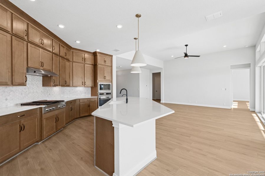 Furnished interior view inside a new home in Megans Landing – Half-Acre Homesites, Castroville (Image 7).