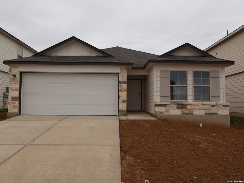 Front exterior of a new home in Agave, San Antonio, TX, highlighting curb appeal (Image 1). Front exterior of a new home in Agave, San Antonio, TX, highlighting curb appeal (Image 1).
