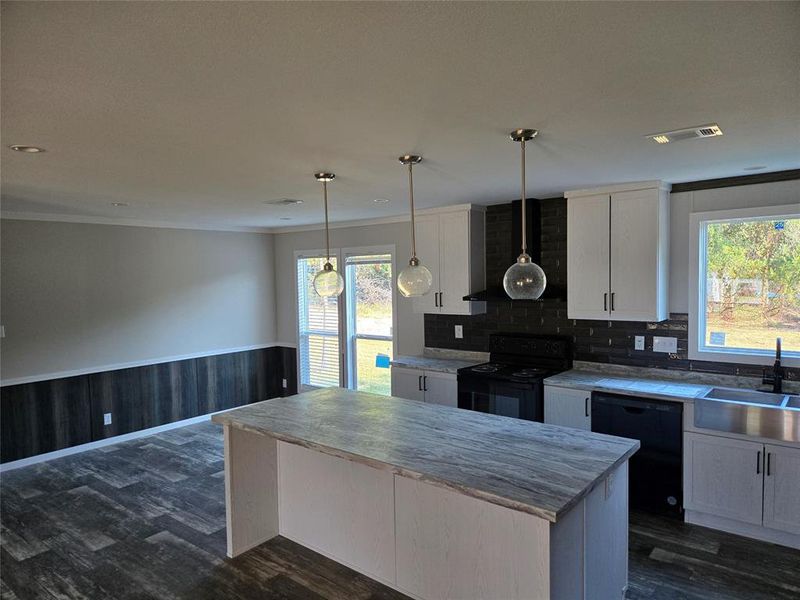 Furnished interior view inside a new home in , Pelican Bay (Image 6).