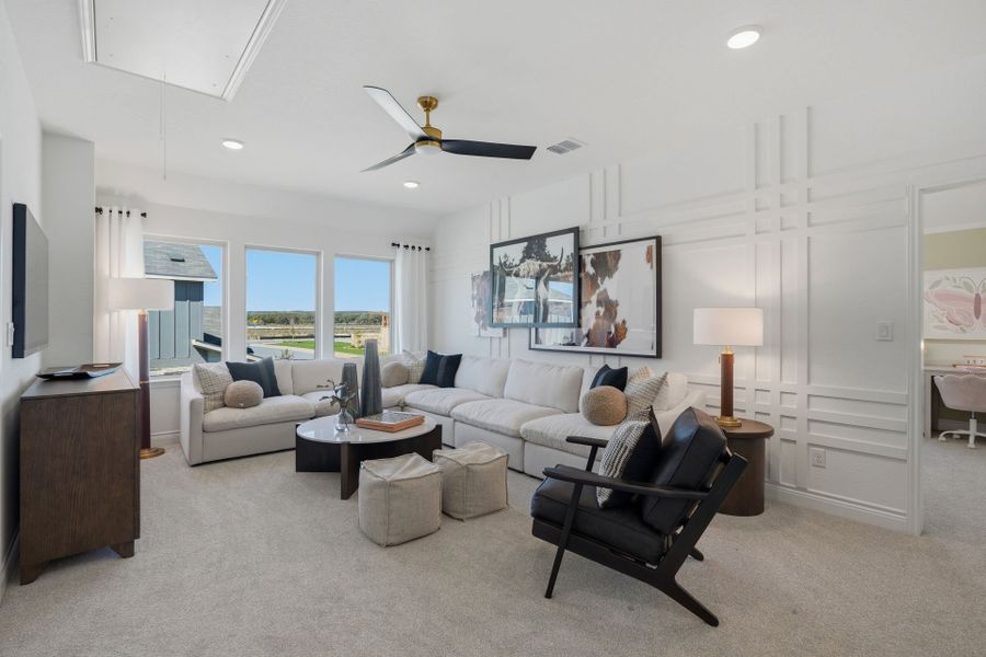 Representative furnished interior of a home built from the Rainier by Pulte Homes in Davis Ranch, San Antonio (Image 5).