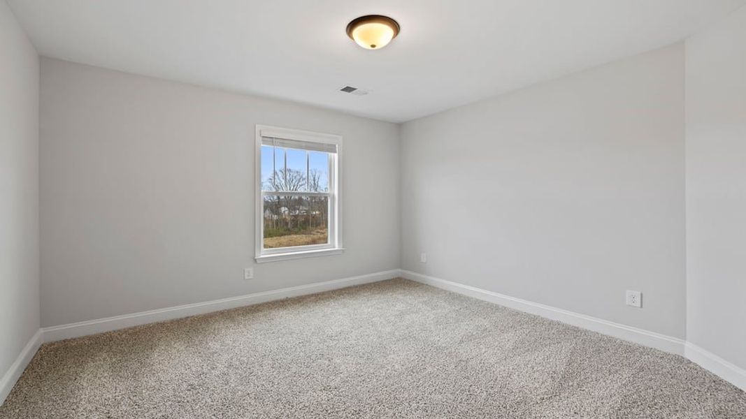 Spacious, unfurnished interior of a new home in Rutledge Estates, Woodruff (Image 24).