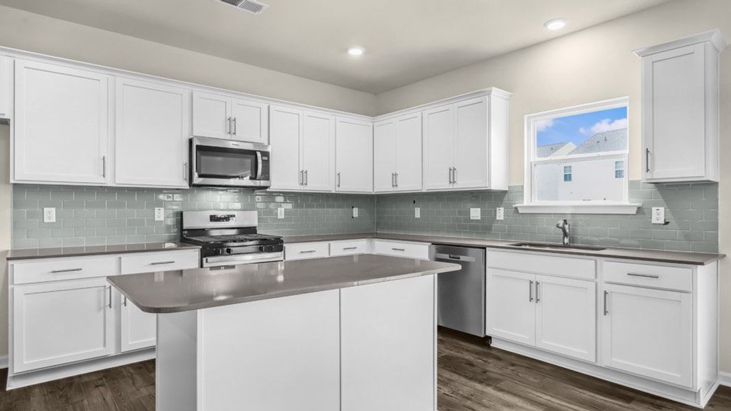 Representative furnished interior of a home built from the COLUMBIA by D.R. Horton in Galvins Ridge, Sanford (Image 4).