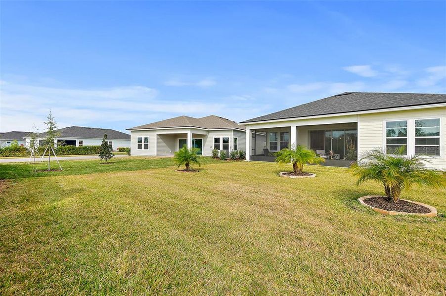 Exterior details and patio area of a home in Reverie at Palm Coast, Palm Coast (Image 27).