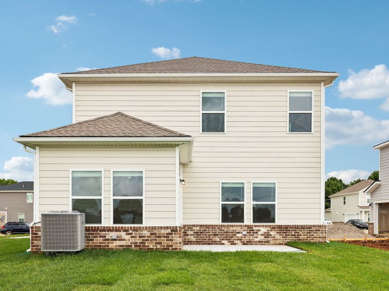 Front exterior of a new home in Avery Farms - Ridge Series, Murfreesboro, TN, highlighting curb appeal (Image 2). Front exterior of a new home in Avery Farms - Ridge Series, Murfreesboro, TN, highlighting curb appeal (Image 2).