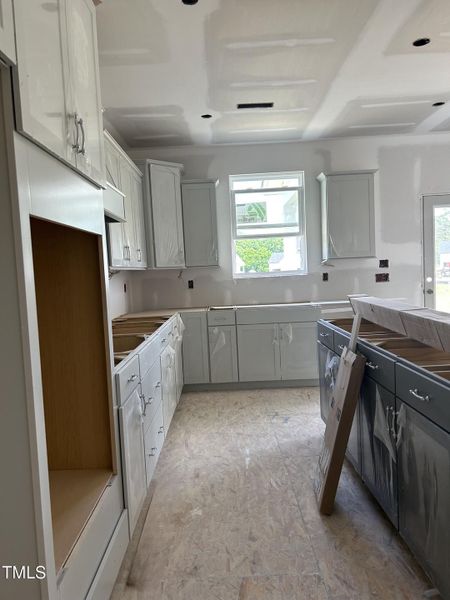 Furnished interior view inside a new home in Tobacco Road, Angier (Image 65).