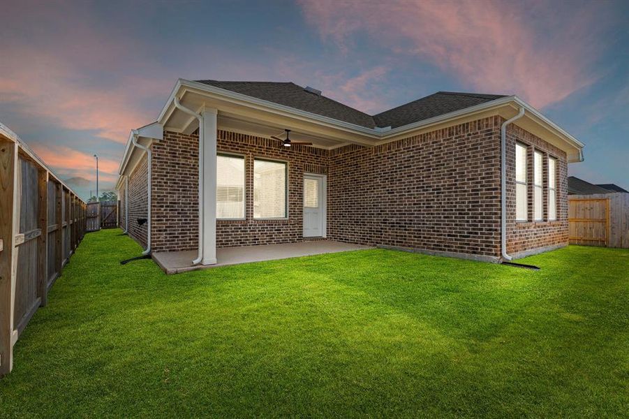 Backyard and view of the covered patio.