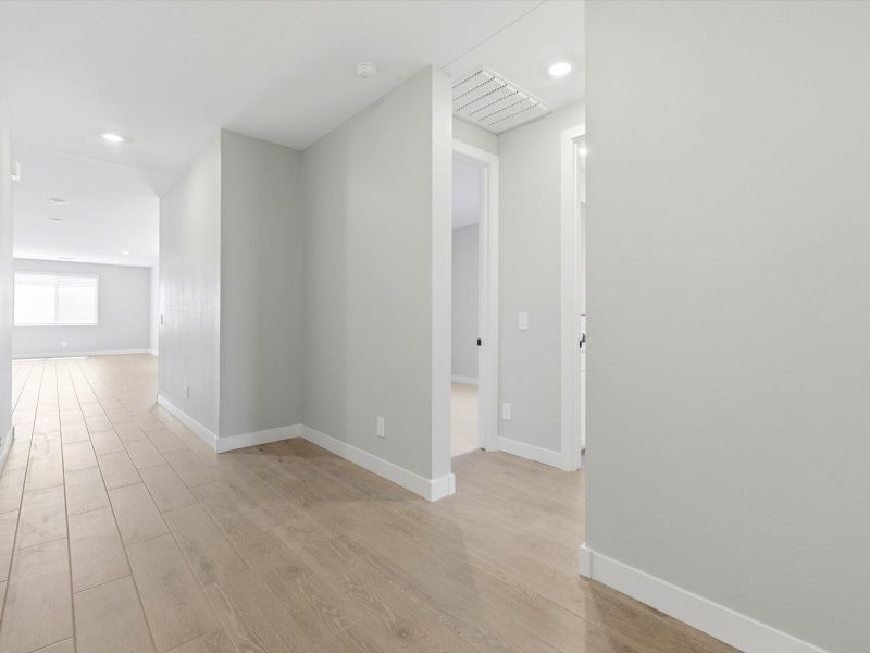 Spacious, unfurnished interior of a new home in White Tank Foothills Reserve Series, Waddell (Image 14). Spacious, unfurnished interior of a new home in White Tank Foothills Reserve Series, Waddell (Image 14).