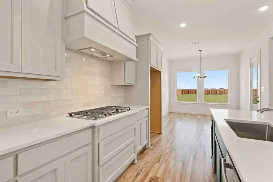 Furnished interior view inside a new home in Settlers Glen, New Fairview (Image 9).