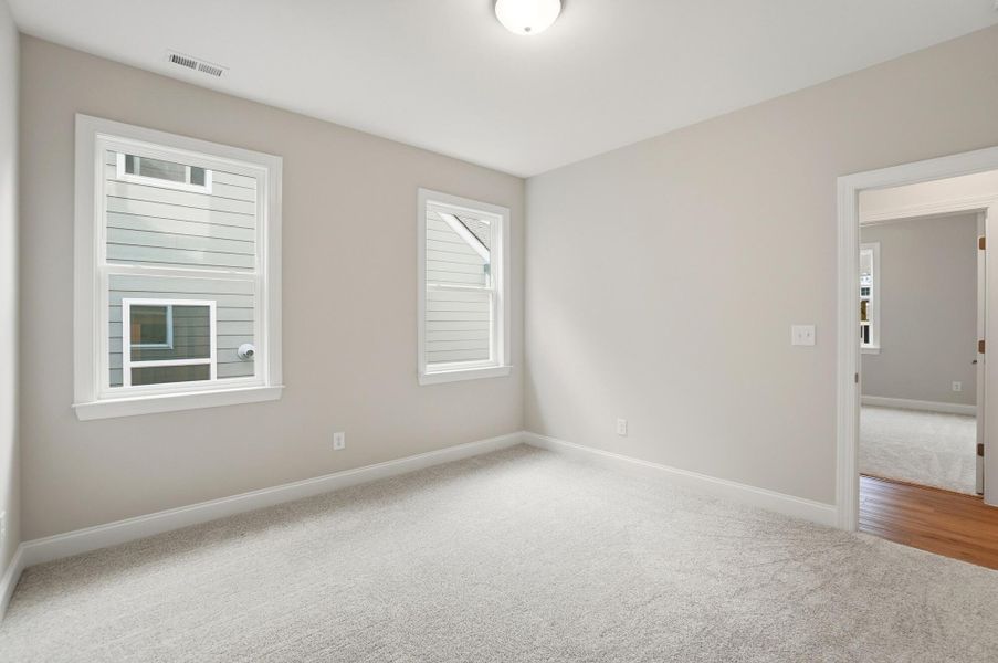 Spacious, unfurnished interior of a new home in Rone Creek, Waxhaw (Image 71).