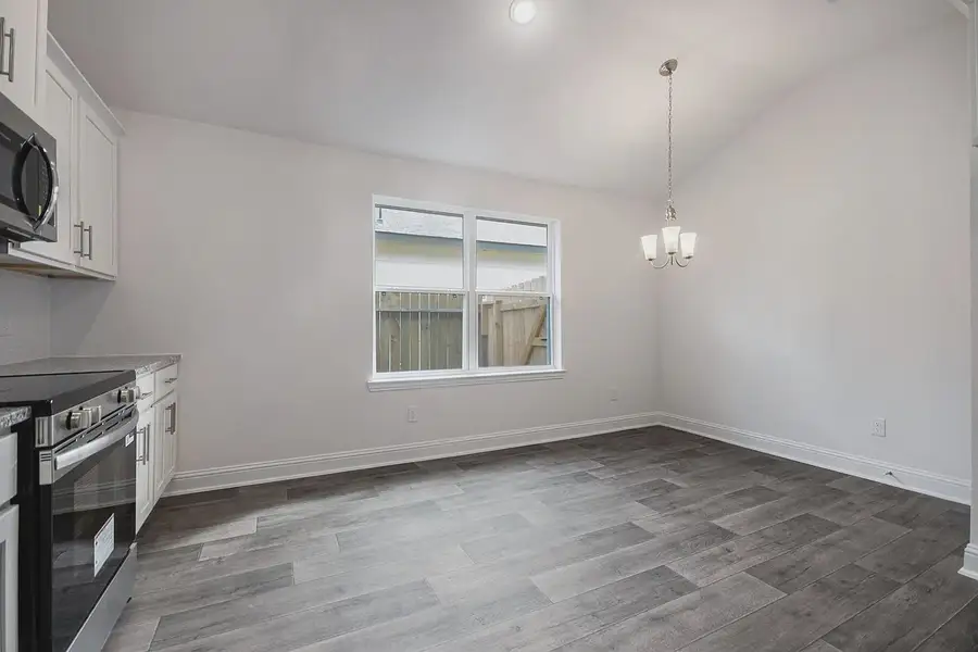 Spacious, unfurnished interior of a new home in Kiber Reserve, Angleton (Image 9). Spacious, unfurnished interior of a new home in Kiber Reserve, Angleton (Image 9).