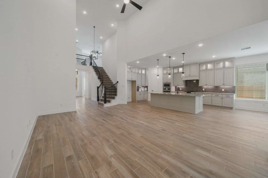Representative unfurnished interior of a home built from the Waterloo by Chesmar Homes in Lakes of Cane Island, Katy (Image 15). Representative unfurnished interior of a home built from the Waterloo by Chesmar Homes in Lakes of Cane Island, Katy (Image 15).