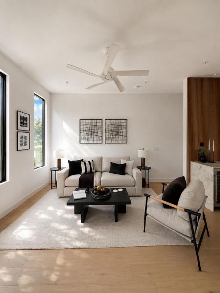Clean lines define this open living space filled with natural light and access to terrace.