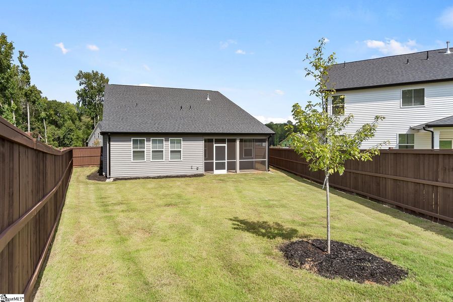 Exterior details and patio area of a home in Saratoga Oaks, Williamston (Image 22).