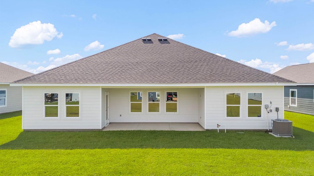 Front exterior of a new home in Liberty, Panama City, FL, highlighting curb appeal (Image 20). Front exterior of a new home in Liberty, Panama City, FL, highlighting curb appeal (Image 20).