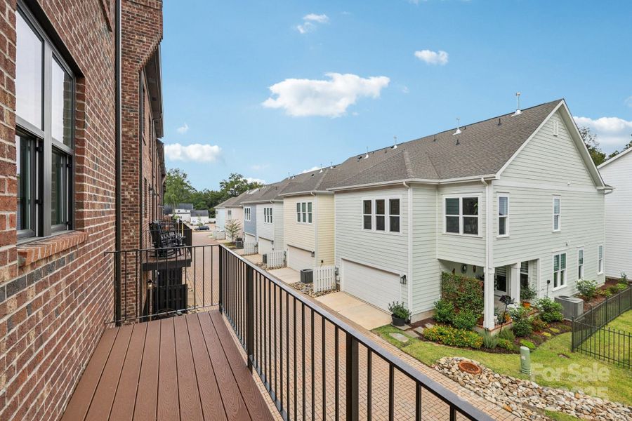 Exterior details and patio area of a home in Walk23, Huntersville (Image 23).