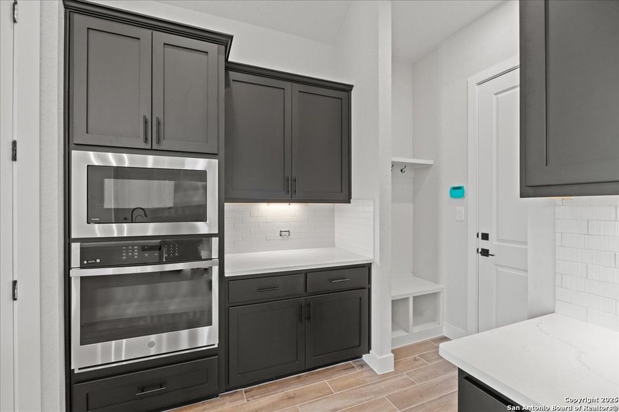 Furnished interior view inside a new home in Village at Three Oaks, Seguin (Image 6).