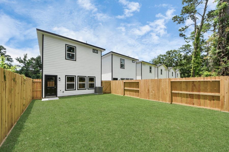 Exterior details and patio area of a home in , Houston (Image 1).