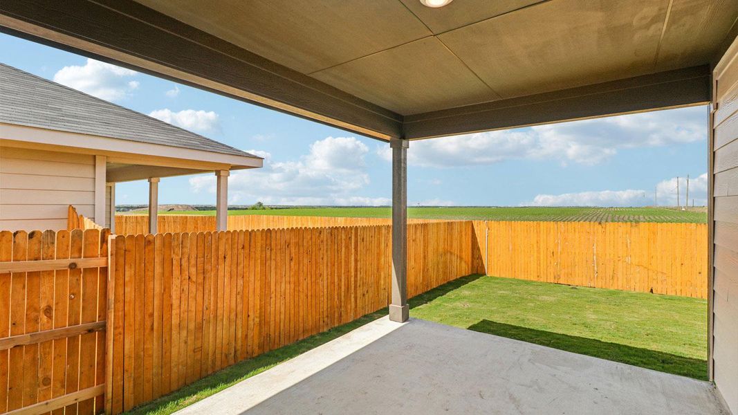 Exterior details and patio area of a home in Monarch Ranch, Manor (Image 16).