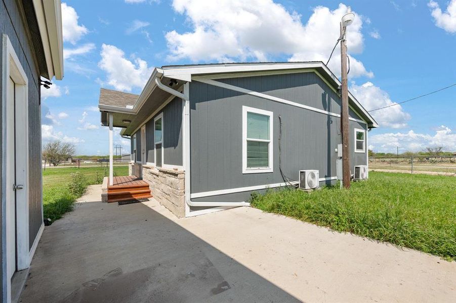 Exterior details and patio area of a home in , Joshua (Image 19).