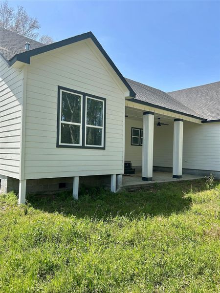 Exterior details and patio area of a home in , Conroe (Image 27).