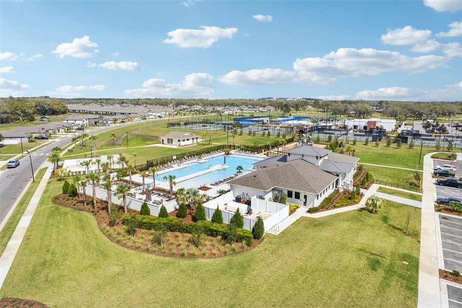 Community clubhouse and pool area. Community clubhouse and pool area.