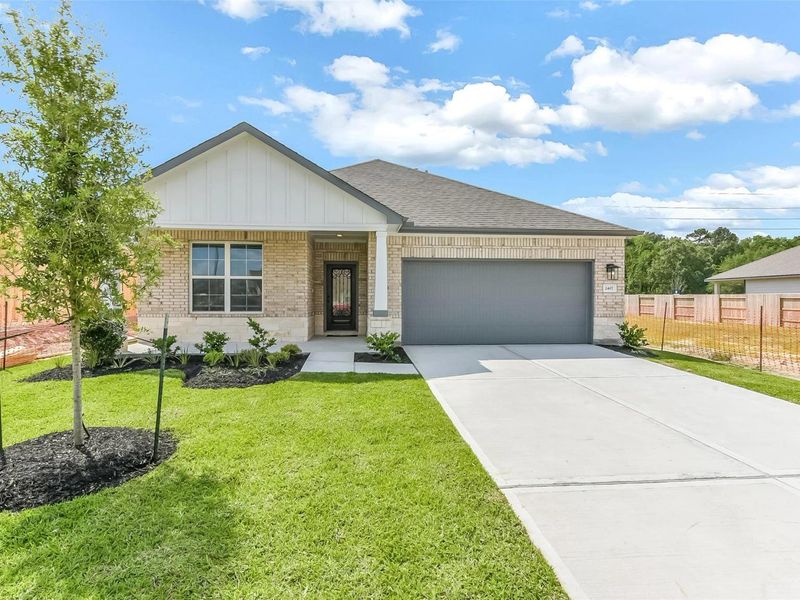 Front exterior of a new home in Sundance Cove, Crosby, TX, highlighting curb appeal (Image 28).