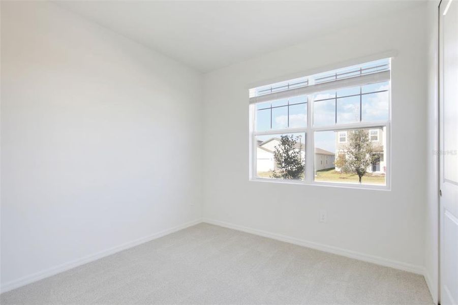 Spacious, unfurnished interior of a new home in Coasterra - Reserve Series, Palmetto (Image 33).