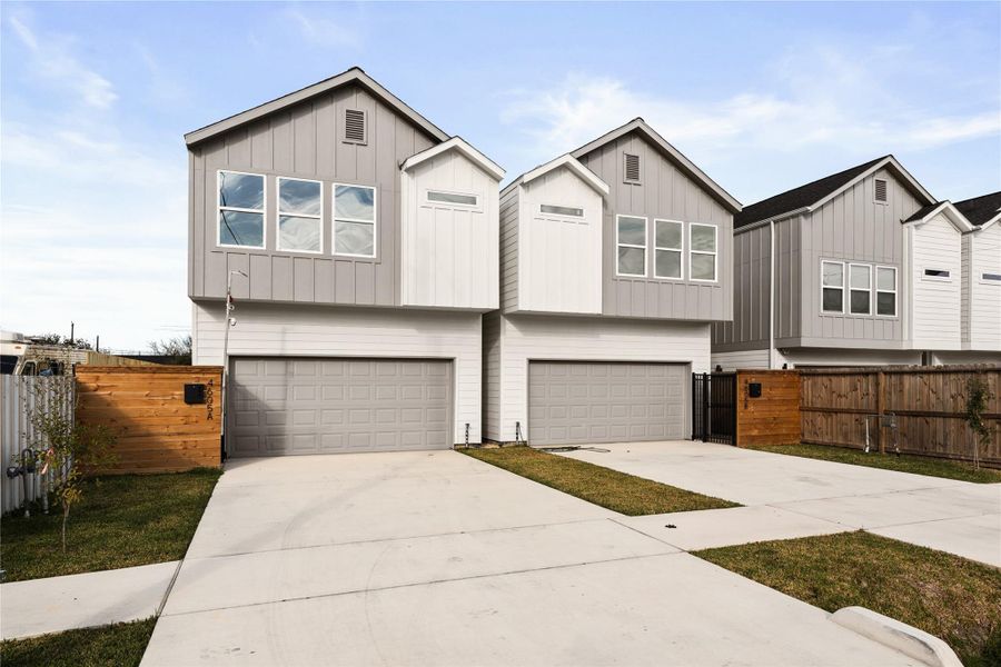 A spacious approach and modern architecture give this home a standout presence while still feeling warm and approachable. The wide driveway and clean exterior finishes set the tone for a home built for comfort, style, and convenience.