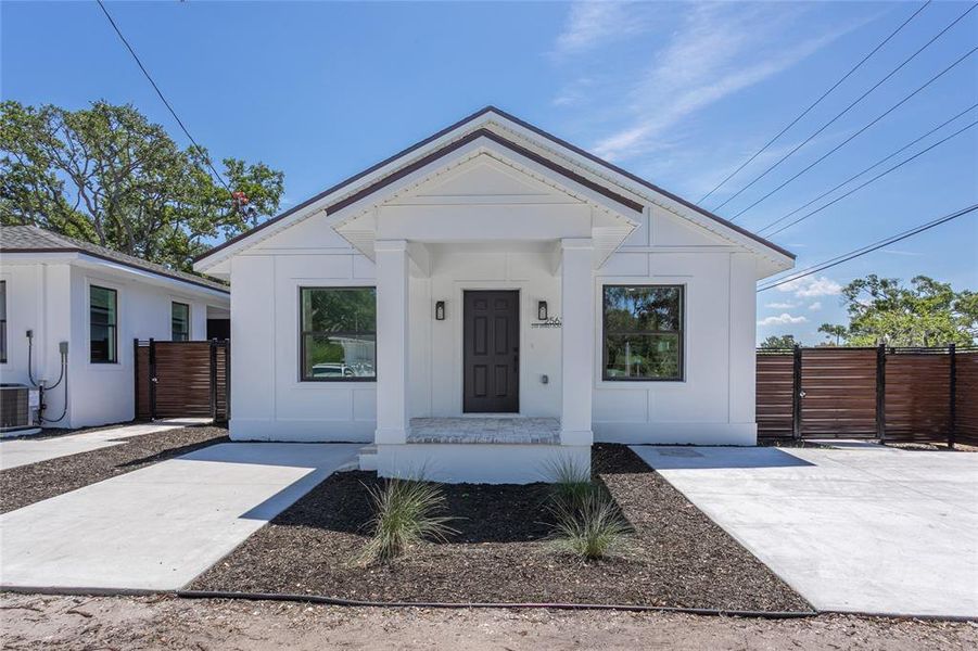 Front exterior of a new home in , St. Petersburg, FL, highlighting curb appeal (Image 26).