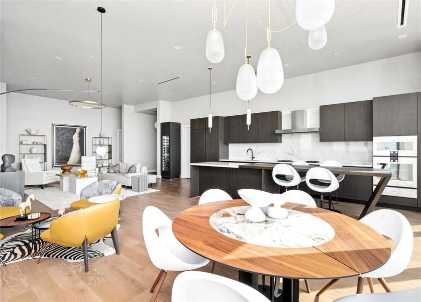 Elegant open-plan living space with seamless flow to the dining area, perfect for entertaining and everyday comfort.