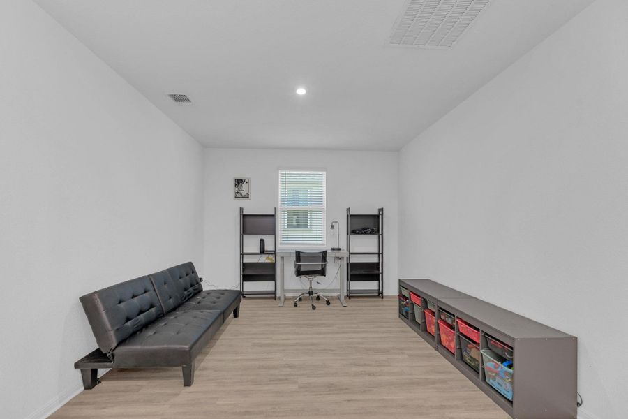 Furnished interior view inside a new home in Seasons at Carillon, Manor (Image 26).