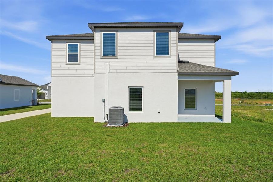 Exterior details and patio area of a home in Gum Lake Preserve, Lake Alfred (Image 30).